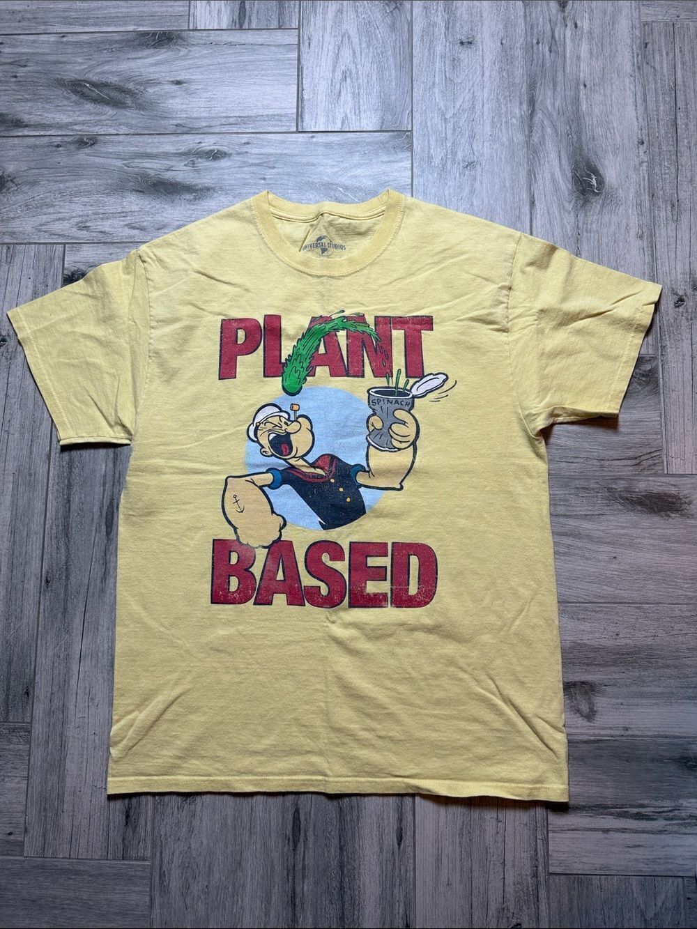 Yellow Universal Popeye Plant-Based Graphic Short Sleeve Tee